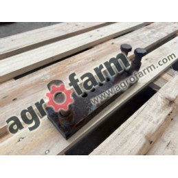Mocowanie dolnego zaczepu New Holland